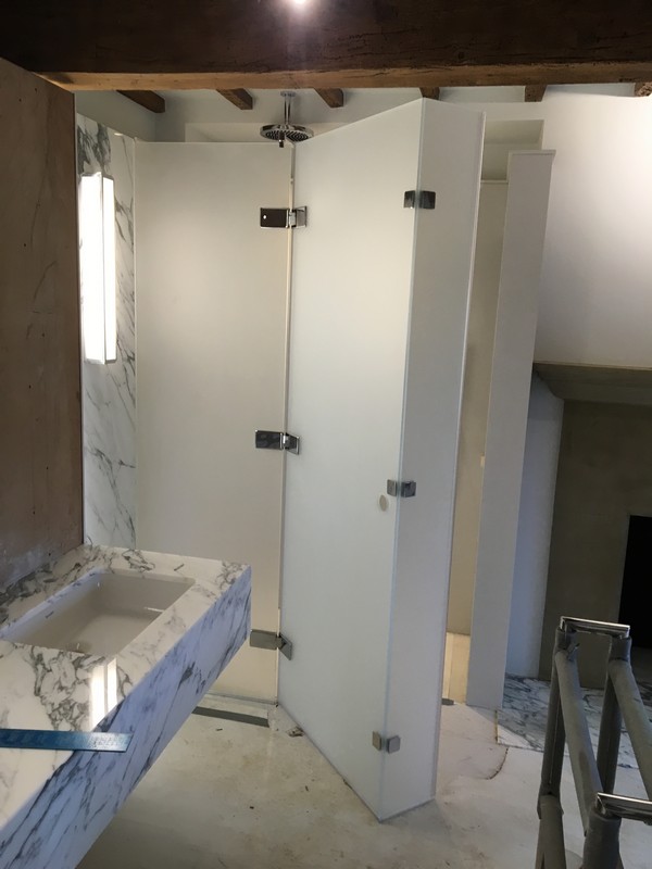 Bespoke frosted glass shower enclosure in Belgravia luxury bathroom
