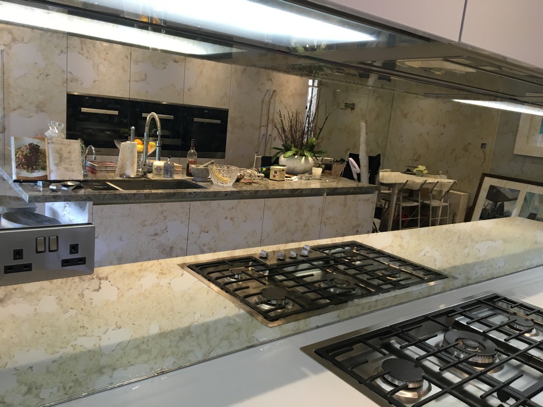 Mirror glass splashback in Belgravia luxury kitchen